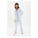 Trendyol modrá pruhovaná pyžamová súprava s detailmi na leme a pleteným spánkovým pásom