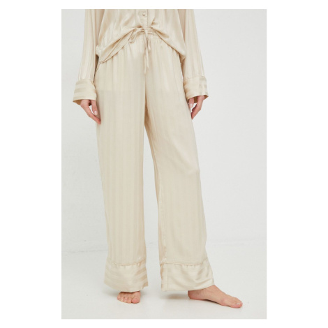 Pyžamové nohavice Abercrombie & Fitch dámske, béžová farba, saténová