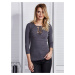 Lady's gray blouse with lace neckline