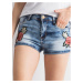 Blue denim shorts with patches