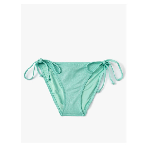 Koton Textured Bikini Bottoms Normal Waist Tie Detail on the sides.