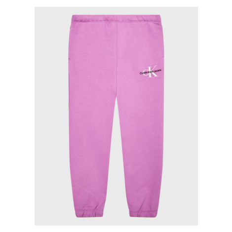 Calvin Klein Jeans Teplákové nohavice Monogram Off Placed IG0IG01854 Fialová Relaxed Fit