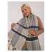 Grey warm women's scarf made of thick knitted fabric with fringe