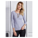 Lady's light grey blouse with lace neckline
