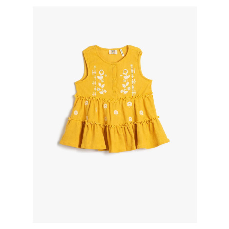 Koton Sleeveless T-Shirt with Embroidered Flowers and Ruffles in a loose fit.