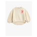 Koton The Printed Back Sweatshirt is round neck, with a ruffled waist, asymmetrical smocked wais