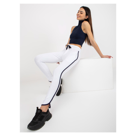 Basic white sweatpants with slit from RUE PARIS