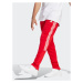 Adidas Teplákové nohavice Tiro Suit-Up Lifestyle Tracksuit Bottoms IB8385 Červená Regular Fit
