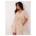 Light beige summer women's ensemble with a button-up blouse