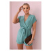 Short jumpsuit with a dark mint waist tie