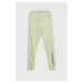 Detské bavlnené tepláky Calvin Klein Jeans zelená farba, s potlačou