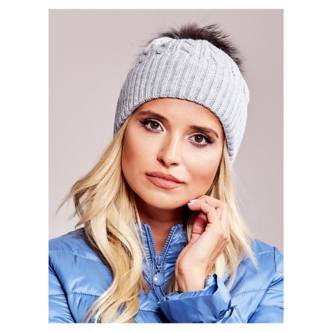 Grey hat with trim and fur pompom