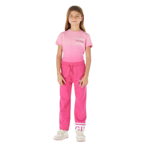 Detské bavlnené tepláky Guess ružová farba, s potlačou