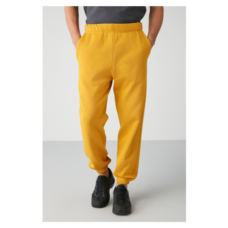 GRIMELANGE Inside Men's Regular Fit Soft Fabric Elastic Waist Saffron Yellow Sweatpant