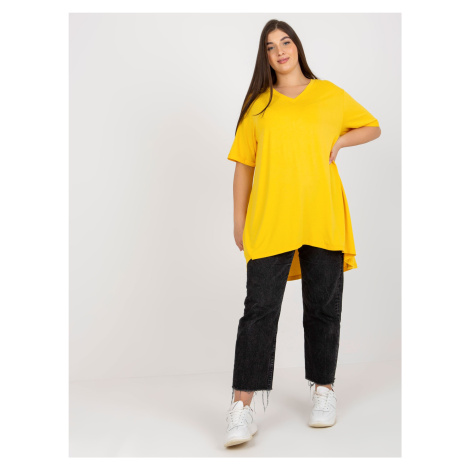 Yellow monochrome blouse of larger size with neckline