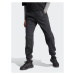 Adidas Teplákové nohavice ALL SZN Fleece Washed HZ2987 Čierna Loose Fit