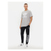 Adidas Teplákové nohavice Essentials French Terry Tapered Cuff Logo Joggers IC0063 Čierna Regula