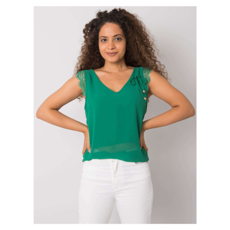 Green top with lace inserts