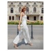 Elegant one-shoulder jumpsuit with ecru wide legs