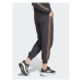 Adidas Teplákové nohavice Essentials 3-Stripes IS2155 Čierna Loose Fit