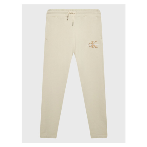 Calvin Klein Jeans Teplákové nohavice Monogram Off Placed IG0IG01607 Écru Regular Fit