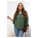 Oversized blouse with khaki button closure