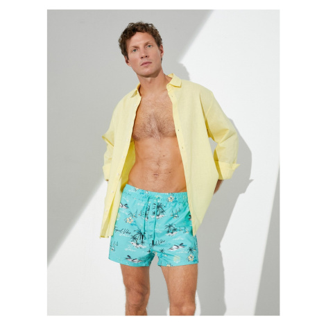 Koton Beach Shorts Summer Theme with a drawstring waist and pockets.