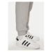Adidas Teplákové nohavice Trefoil Essentials IR7803 Sivá Regular Fit