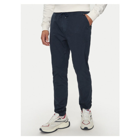 Tommy Jeans Jogger nohavice Austin DM0DM19487 Tmavomodrá Slim Fit Tommy Hilfiger