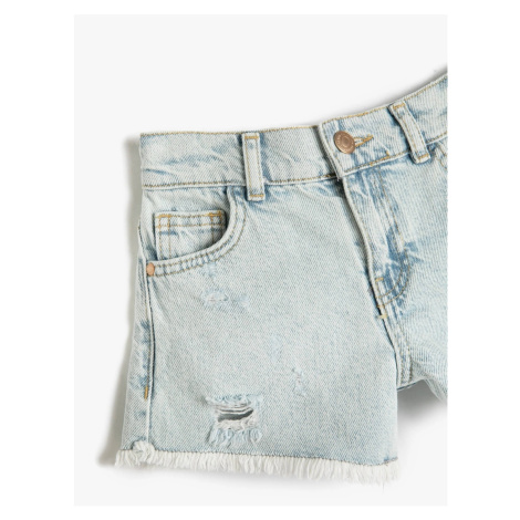Koton Denim shorts with pockets, frayed details, cotton tassels around the edges, and an adjusta