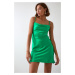 Delicate minidress with green shoulder straps