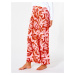 Červené dámske vzorované široké nohavice Rip Curl