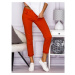 Plain pants with orange pockets