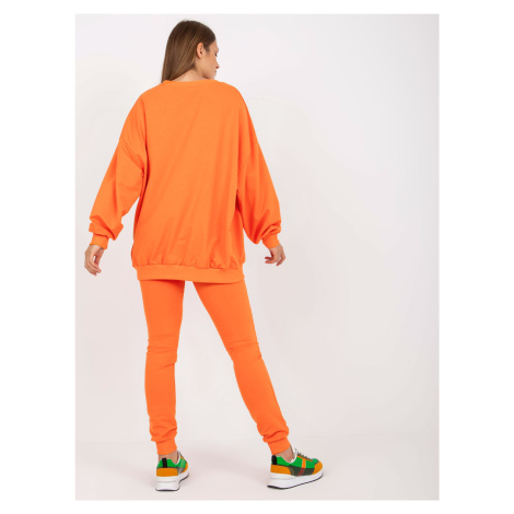 Orange tracksuit with patches