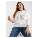 White cotton blouse of larger size with application