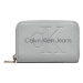 Calvin Klein Jeans Malá dámska peňaženka Sculpted Med Zip Around Mono K60K612255 Sivá