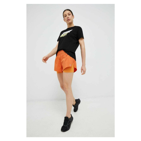 Bežecké šortky Reebok oranžová farba, jednofarebné, stredne vysoký pás