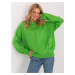 Light green women's oversize sweater with holes