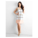 White and peach colored checked dress