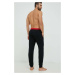 Pyžamové nohavice HUGO pánske,čierna farba,jednofarebná,50480236