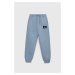 Detské bavlnené tepláky Calvin Klein Jeans s nášivkou