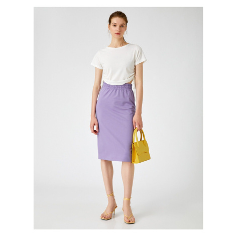 Dámska fialová sukňa značky Koton