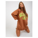 Light brown and green long sweatshirt with slogan