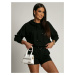 Women's tracksuit with black shorts