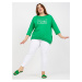 Plus size green blouse with patch and printed design