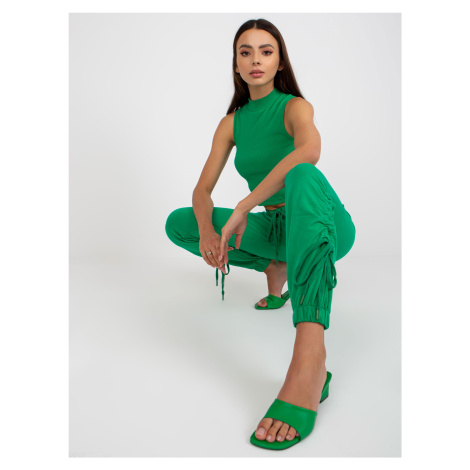Green cotton sweatpants with ribbed cuffs