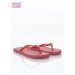Fashionable and comfortable red women´s flip flops for the beach