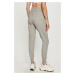 Nohavice New Balance WP03530AG dámske, šedá farba, melanžové
