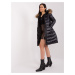 Black quilted winter jacket with fur