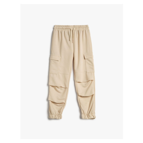 Koton Cargo Sweatpants with Layer Details Side Pockets with Tie Waist.